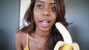 Black Girl Blowing Banana